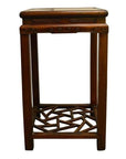 Light brown wooden side table with straight legs and a lower shelf in cracked ice lattice design.