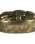Silver plate oval jewelry box with ornate floral and fruit engravings on white background.