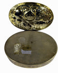 Silver plate jewelry box with lid, embossed fruit design, base shows paper labels and visible wear.