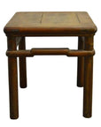 Natural elm wood square table or stool with rustic finish, shown in close-up as a versatile furniture piece.