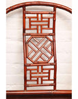 Close-up of brown bamboo and elm horseshoe-back armchair with geometric and circular patterns, 19th century Chinese style.