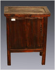 Small brown elmwood side table with four legs and rectangular top, shown against a plain background.