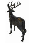 Bronze buck sculpture with large antlers, lost wax cast, standing and facing slightly away.