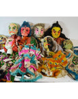 Colorful fabric Taiwan Opera dolls with ornate costumes, displayed on a white surface, close-up view.