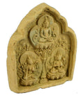 Brown terracotta miniature Thai shrine with ornate relief, featuring three seated Buddhist figures, close-up view.