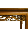 Antique carved wood table with ornate Chinese detailing, shown against a plain white background.