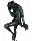 Verde gris bronze frog sculpture "Michelle" in jacket, tipping hat on one leg, close-up, lost wax technique.