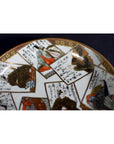 White porcelain plate with hand painted Japanese art and calligraphy on rectangular panels, vintage style, close-up.