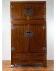 Brown Chinese elm wooden wardrobe with metal hinges, four doors, and four drawers, two-piece compound design.