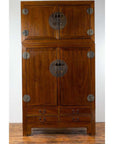 Brown Chinese elm wood wedding wardrobe with metal hinges, two sections, on a wooden floor.