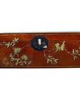 Black lacquered Chinese dowry box with hand-painted floral and bird motifs, vibrant colors, central metal latch, close-up.