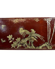 Dark brown lacquered wood dowry box with gold hand painted birds, flowers, and bamboo, close-up view.