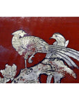 Red lacquered box with hand-painted gold birds and long tails perched on a branch, vintage Chinese style.