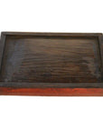 Close-up of vintage dark wood Chinese tray with raised edge and ornate hand-painted design, reddish-brown border visible.