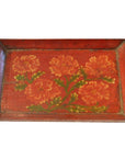 Red vintage Chinese hand painted ornate tray with orange flowers and green leaves in the center, close-up.