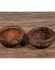 Brown rattan hat boxes with weathered patina, vintage Chinese mid-century style, side by side on wooden floor indoors.