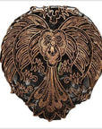 Close-up of vintage copper Batek ink block featuring bold, stylized bird patterns and ornate engraved details.