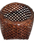 Brown rattan woven basket with open top and crisscross lattice design, vintage Thai style, close-up view.