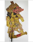 Colorful Balinese cowhide Wayang Kulit shadow puppet with ornate costume and exaggerated features on white background.