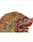 Balinese cowhide shadow puppet with pink snout, bulging eye, and striped mane in side profile.