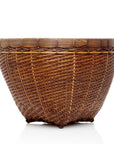 Large round hand-stitched rattan basket with sturdy rim on a white background.