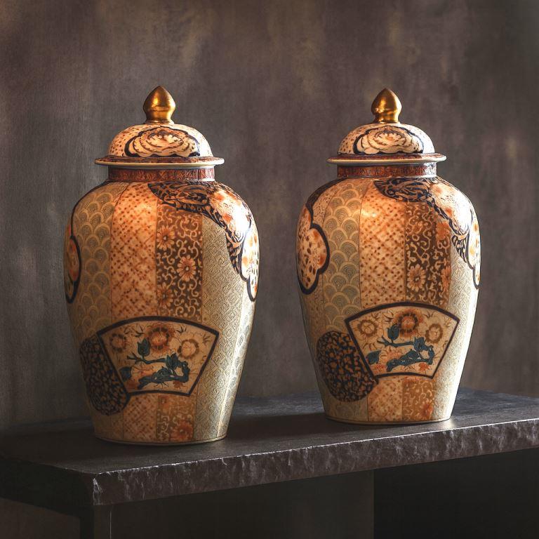 Pair of Arita Style Lidded Jars with Gold, Blue and Orange Floral Motifs