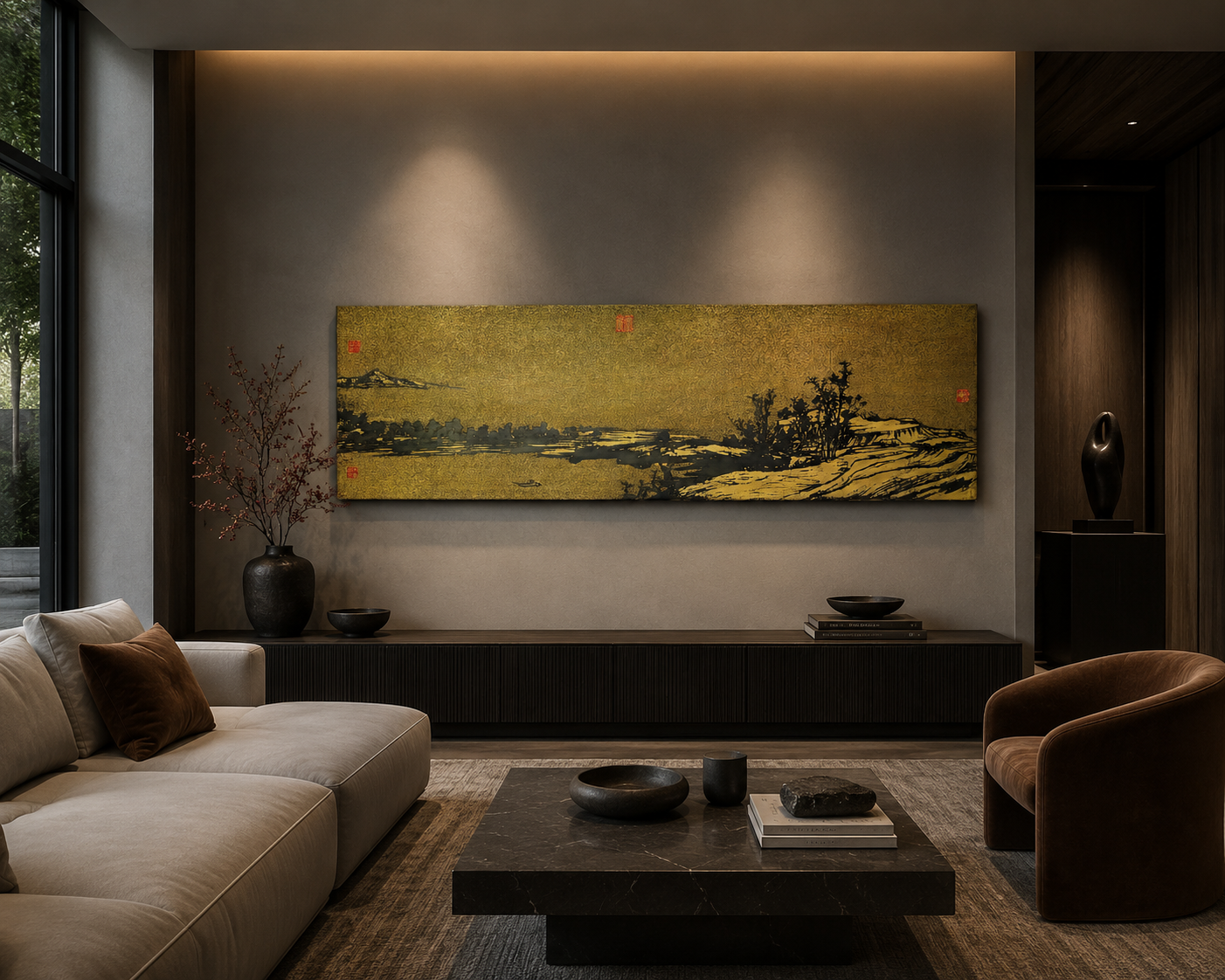 Gilt metal landscape wall panel with red seal marks above a low console in a modern living room with neutral tones.