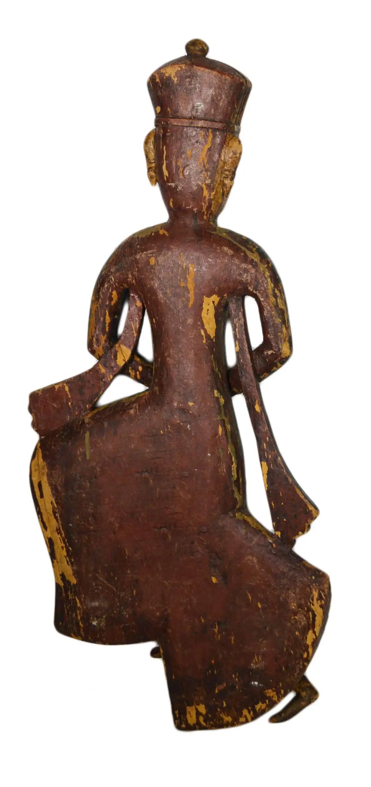 Wooden figurine of a seated figure with intricate carvings on a white background