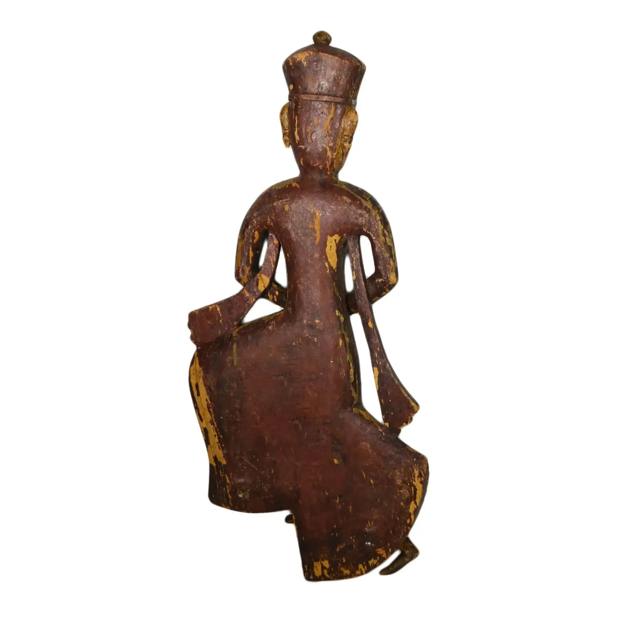 Wooden figurine of a seated figure with intricate carvings on a white background