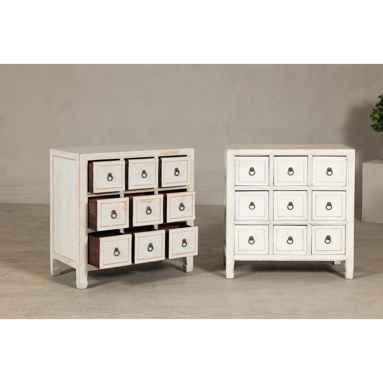 Vintage Distressed White Lacquer Apothecary Chests – Near Pair with Nine Drawers