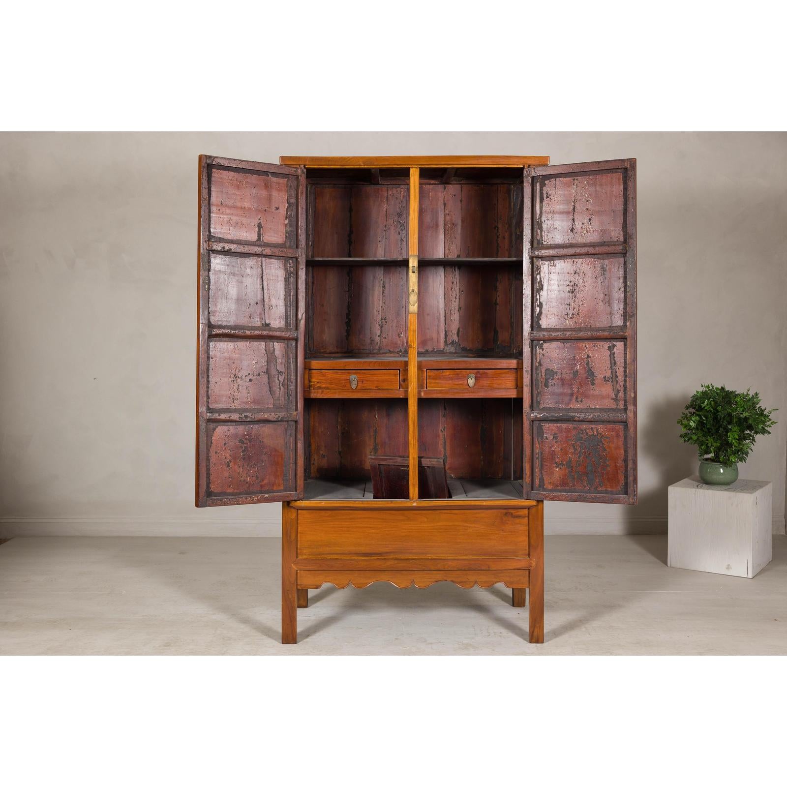 Late Qing Dynasty Elm Armoire with Storage Drawers and Hidden Lower Compartment
