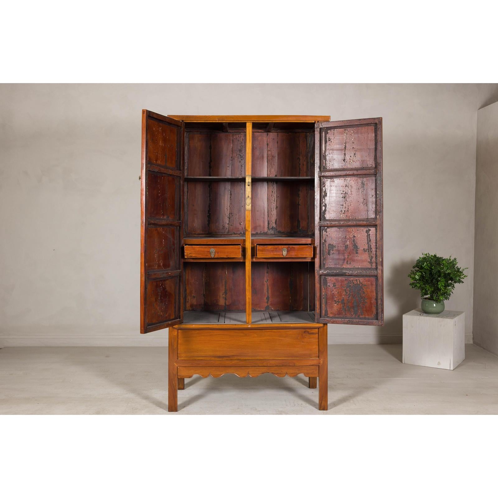 Late Qing Dynasty Elm Armoire with Storage Drawers and Hidden Lower Compartment