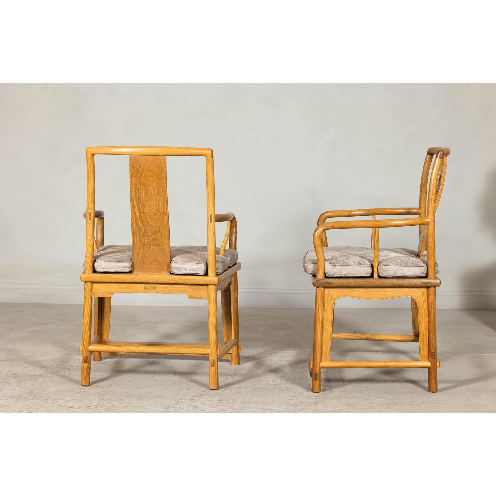 Pair of Ming-Style Hardwood Armchairs with Carved Medallion and Cushions