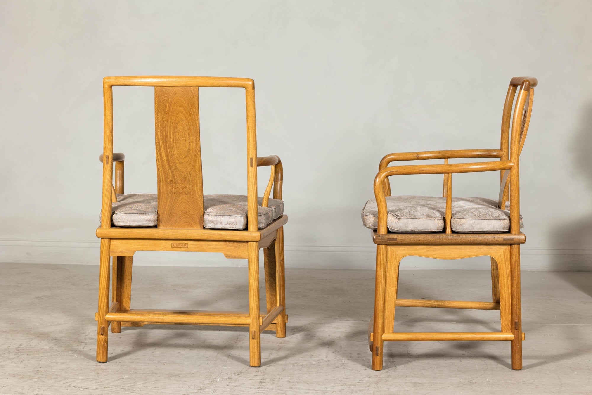Pair of Ming-Style Hardwood Armchairs with Carved Medallion and Cushions