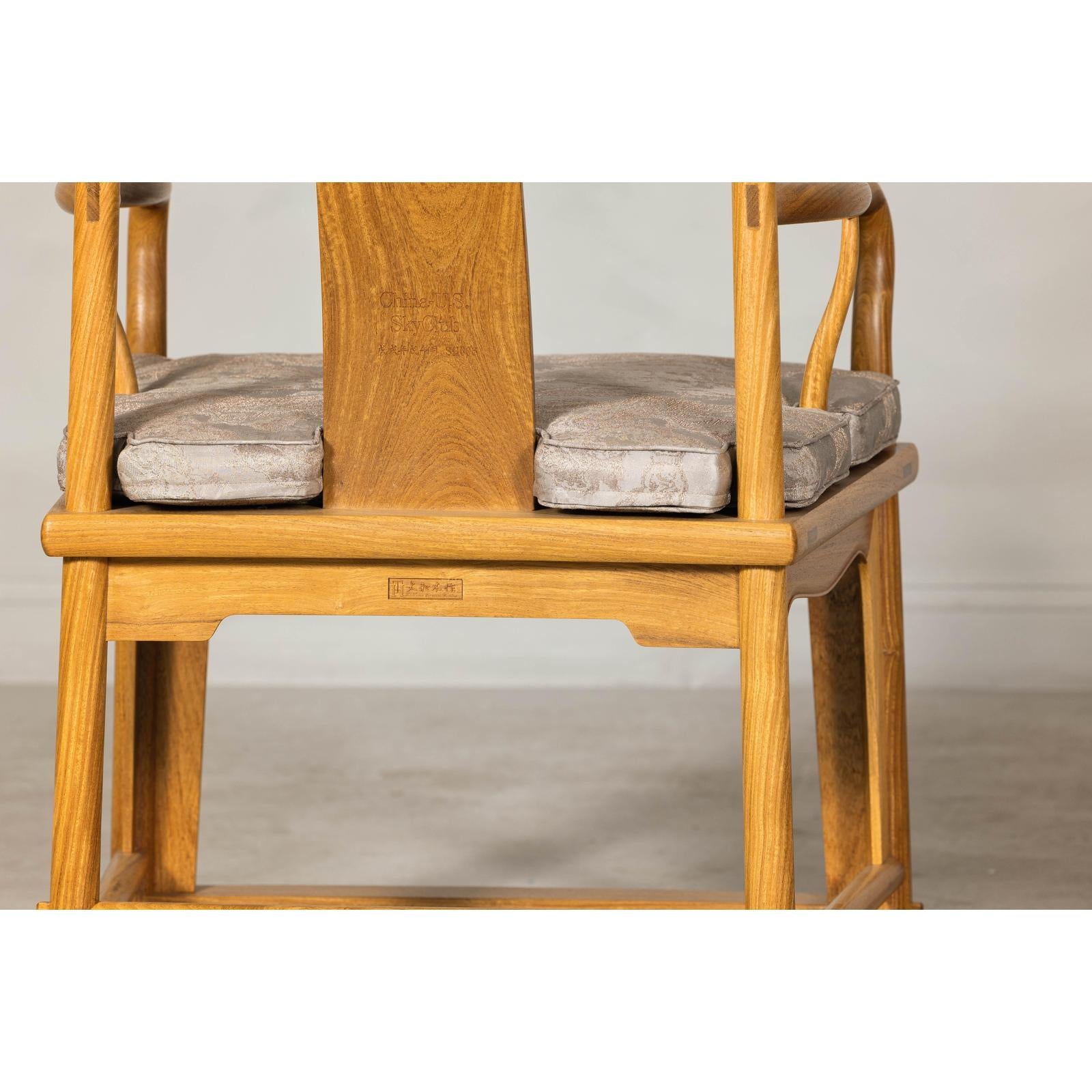 Pair of Ming-Style Hardwood Armchairs with Carved Medallion and Cushions
