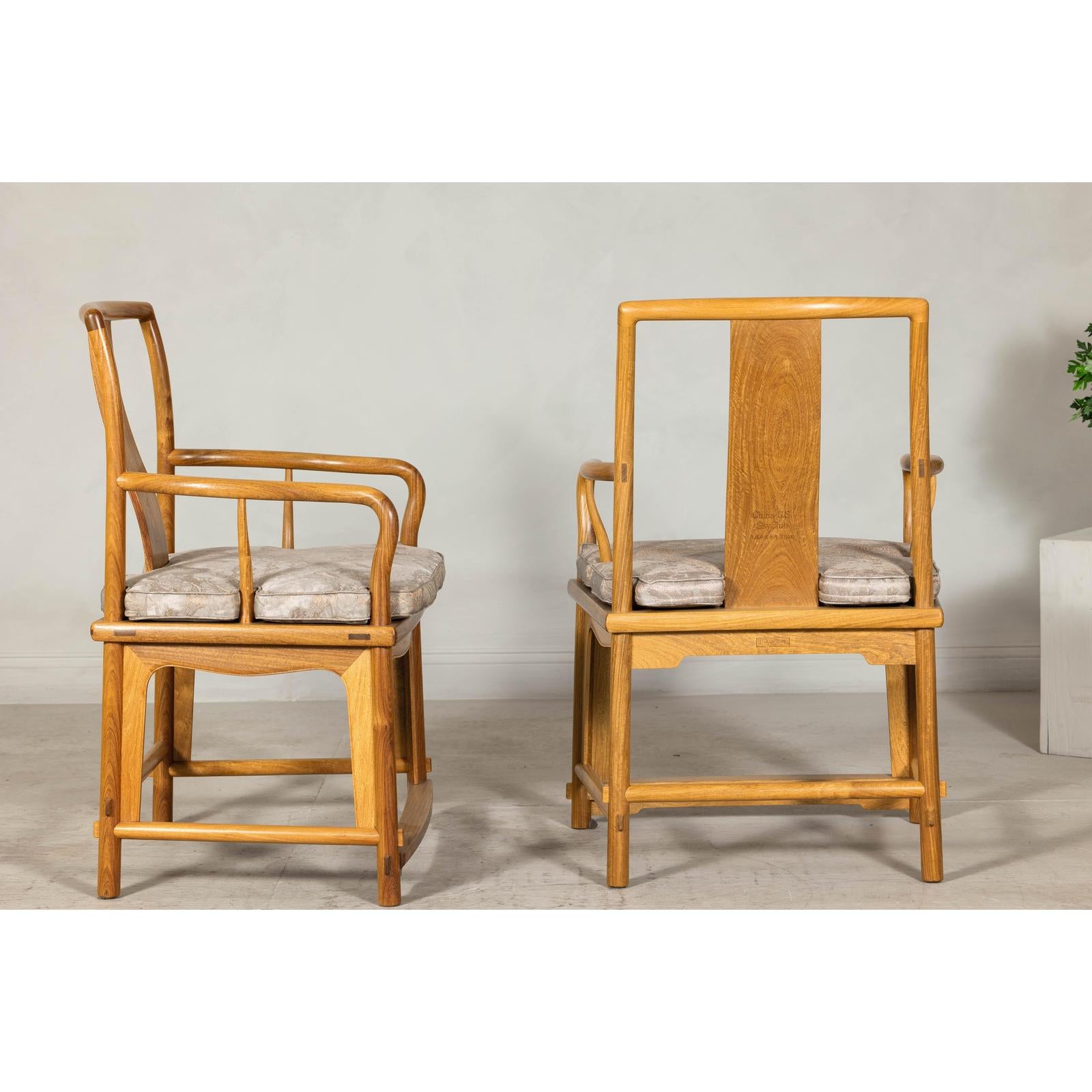 Pair of Ming-Style Hardwood Armchairs with Carved Medallion and Cushions