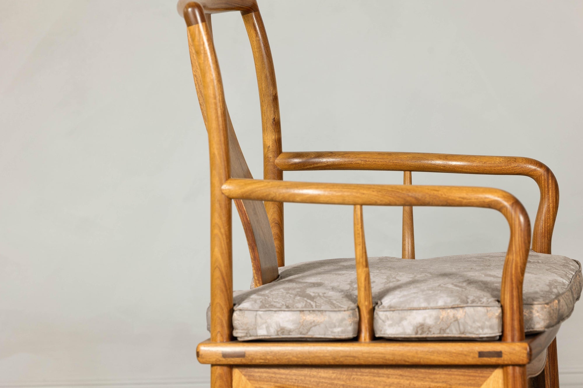 Pair of Ming-Style Hardwood Armchairs with Carved Medallion and Cushions