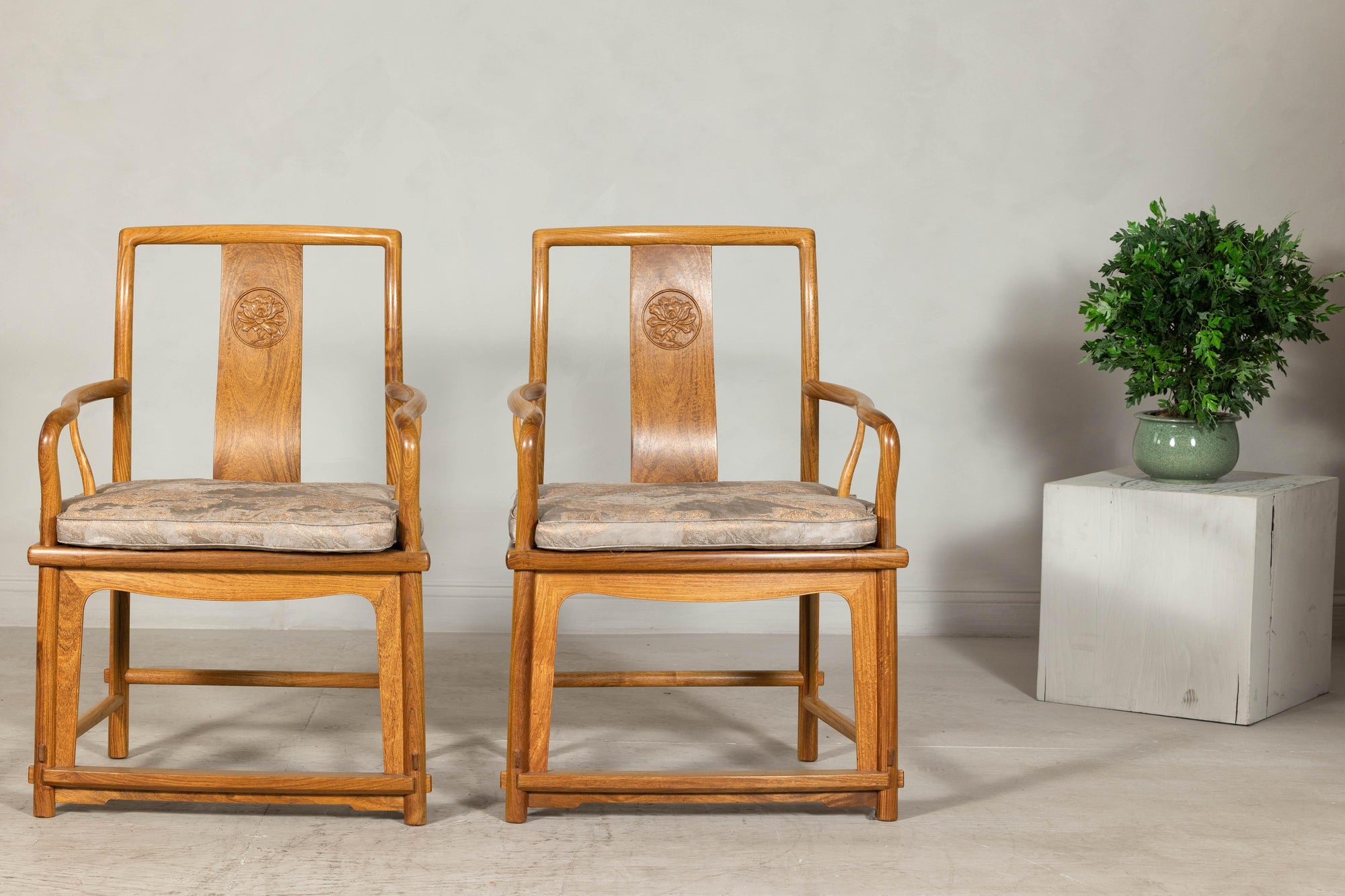Pair of Ming-Style Hardwood Armchairs with Carved Medallion and Cushions