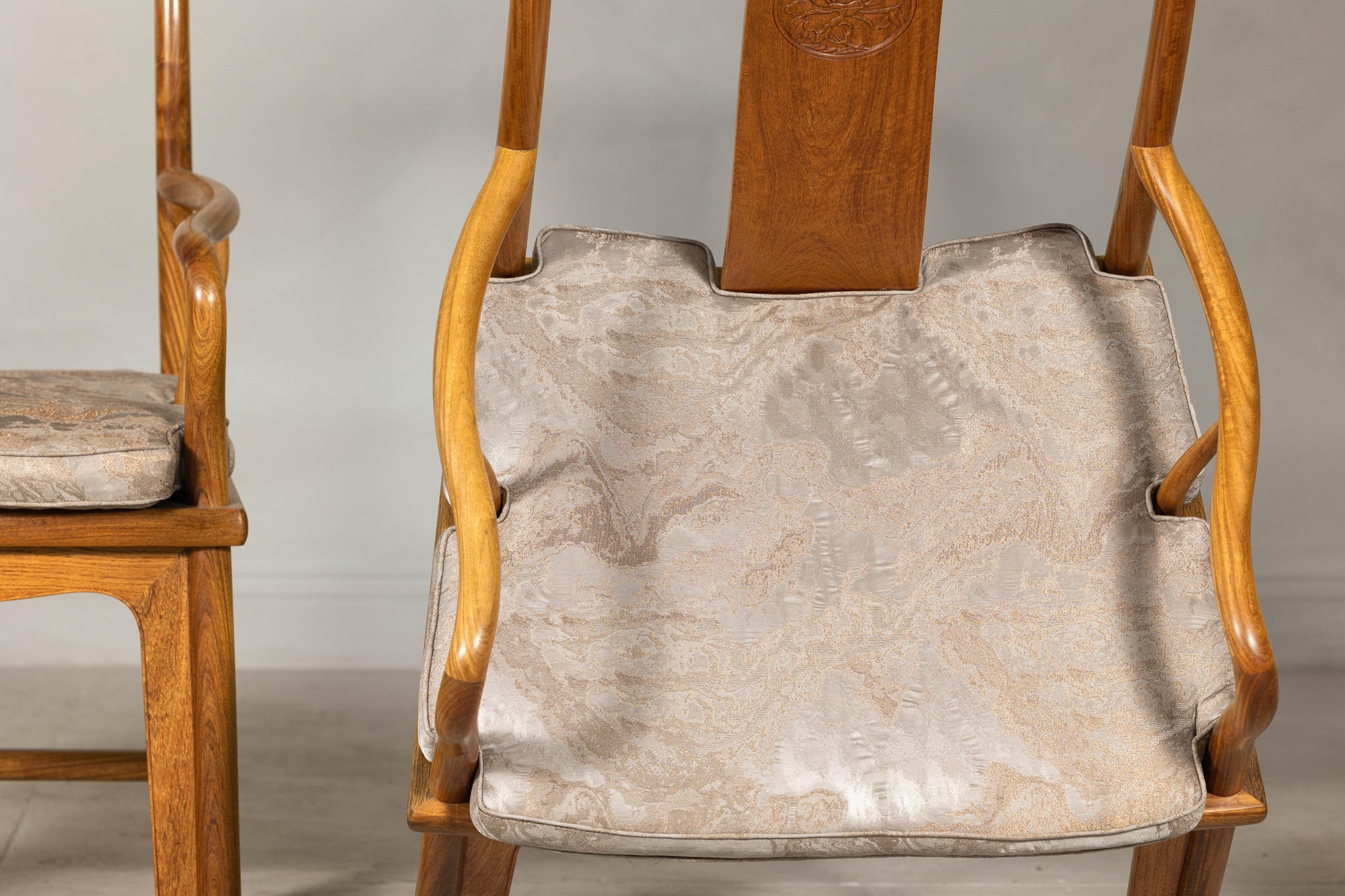 Pair of Ming-Style Hardwood Armchairs with Carved Medallion and Cushions