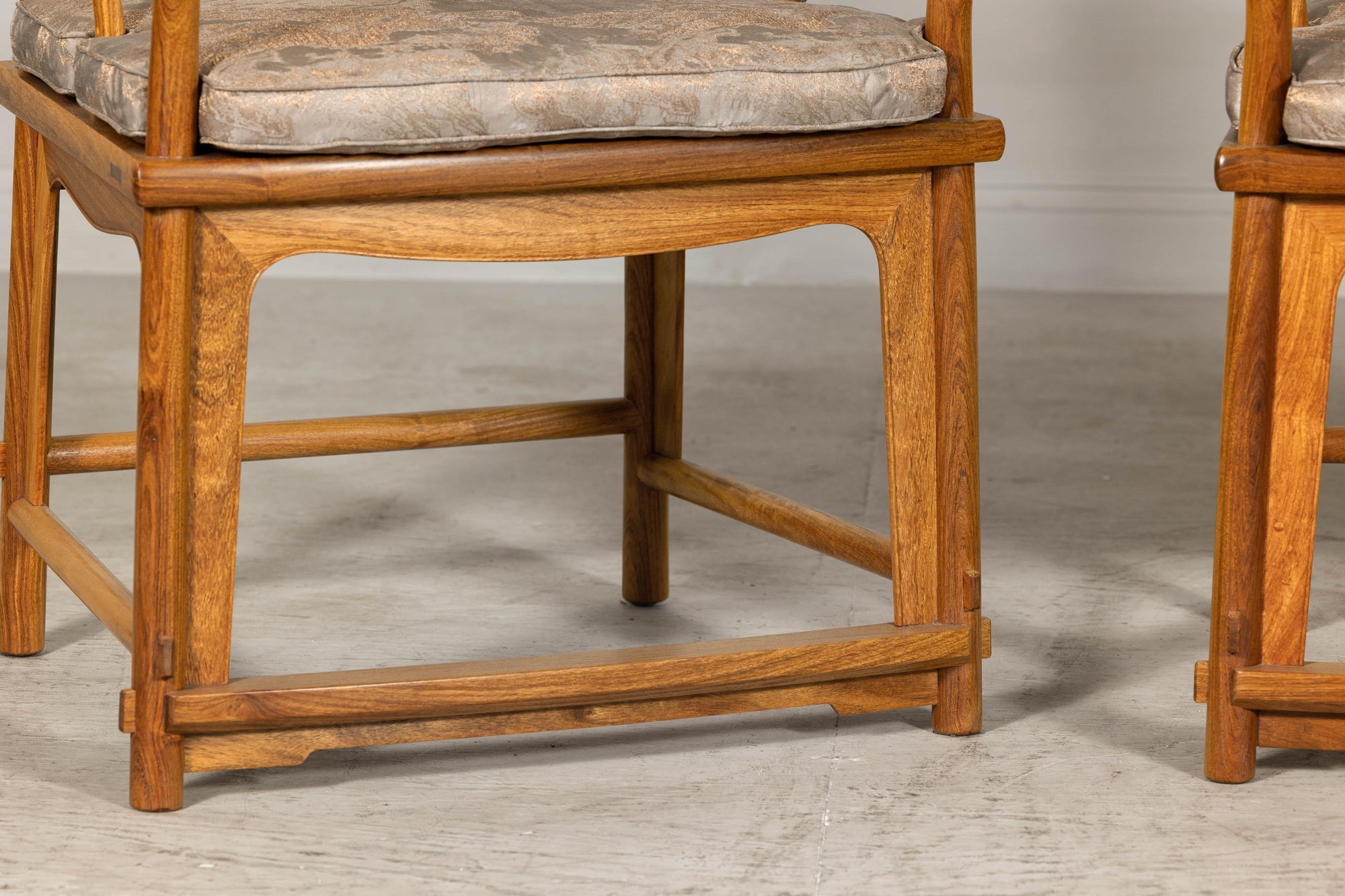Pair of Ming-Style Hardwood Armchairs with Carved Medallion and Cushions