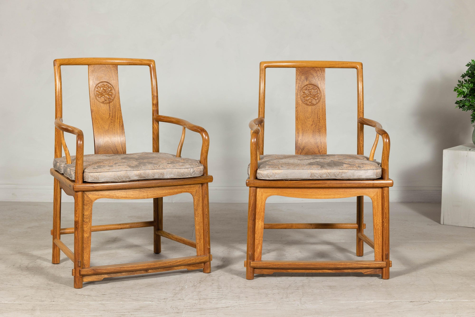 Pair of Ming-Style Hardwood Armchairs with Carved Medallion and Cushions