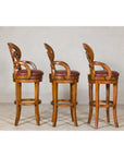 Swivel Bar Stools with Carved Backs and Faux Leather Seats – Set of Three