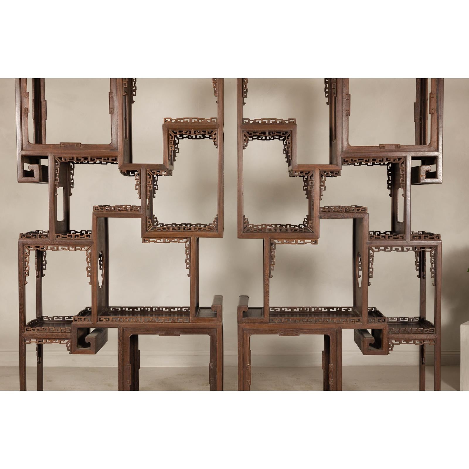 Pair of Late Qing Dynasty Brown Lacquered Display Shelves with Fretwork Motifs