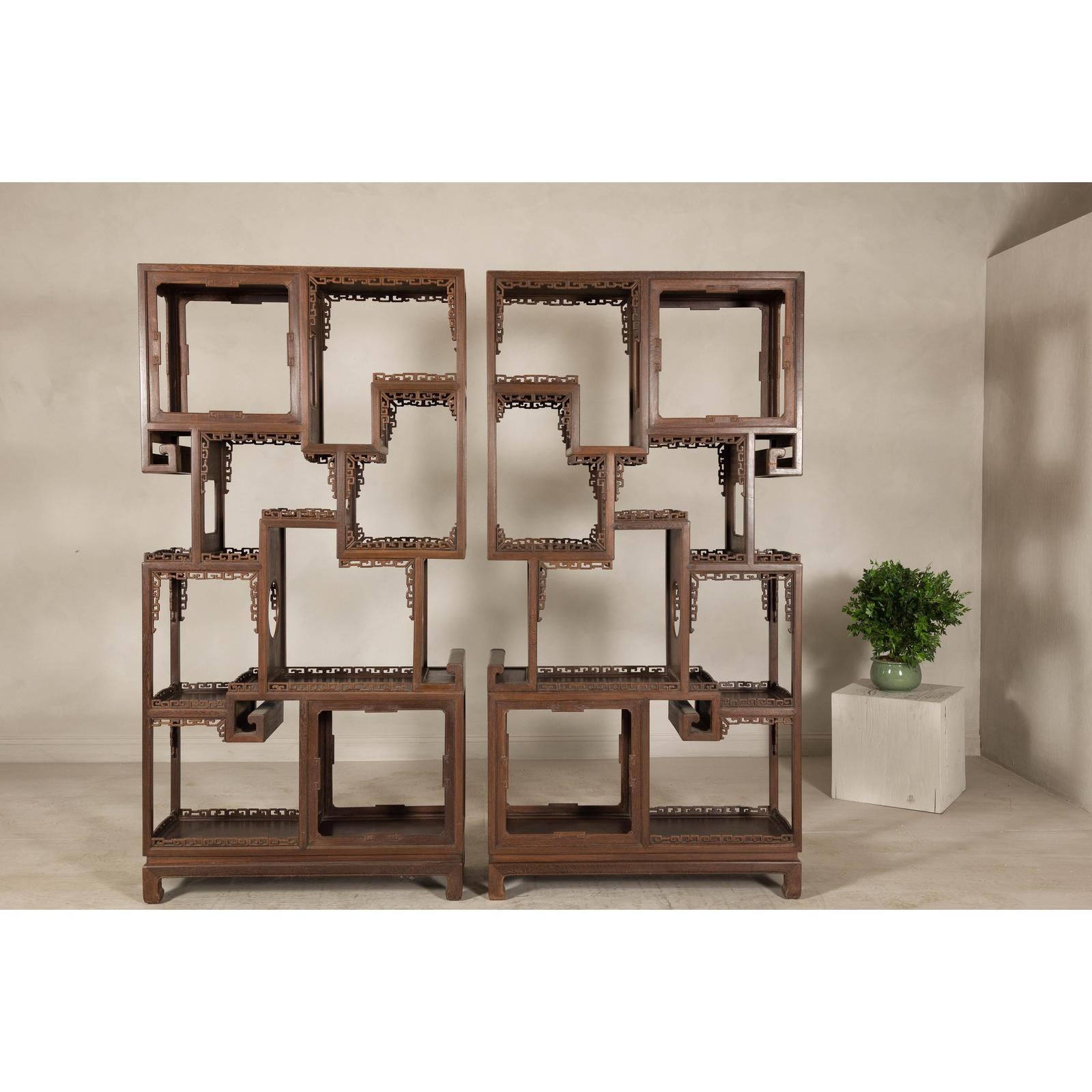 Pair of Late Qing Dynasty Brown Lacquered Display Shelves with Fretwork Motifs