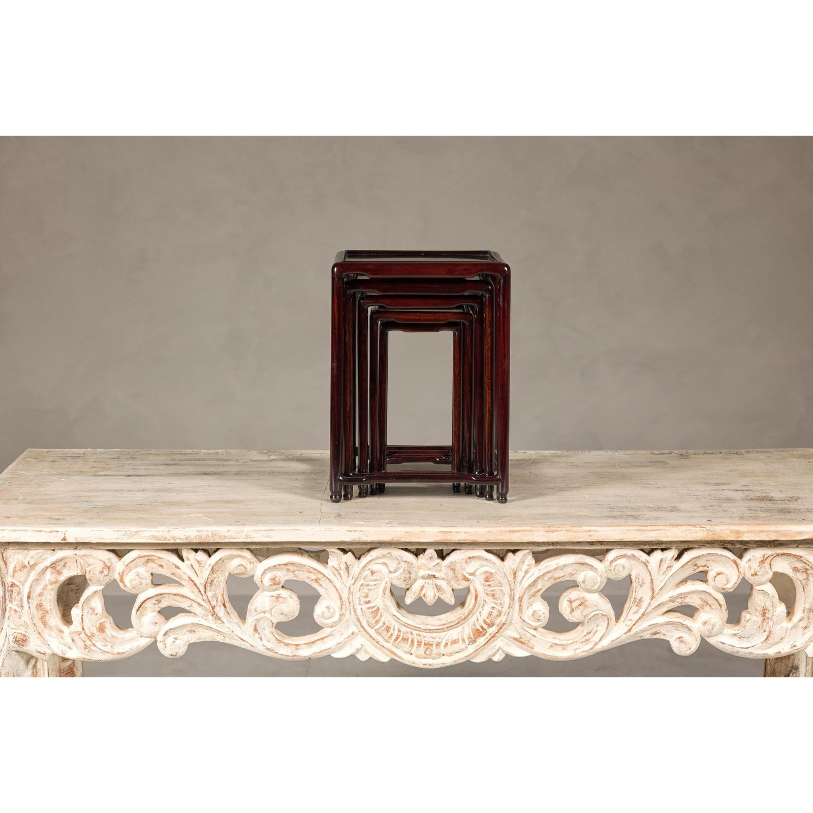 Set of Five Small Size Dark Rosewood Nesting Tables with Humpback Stretchers