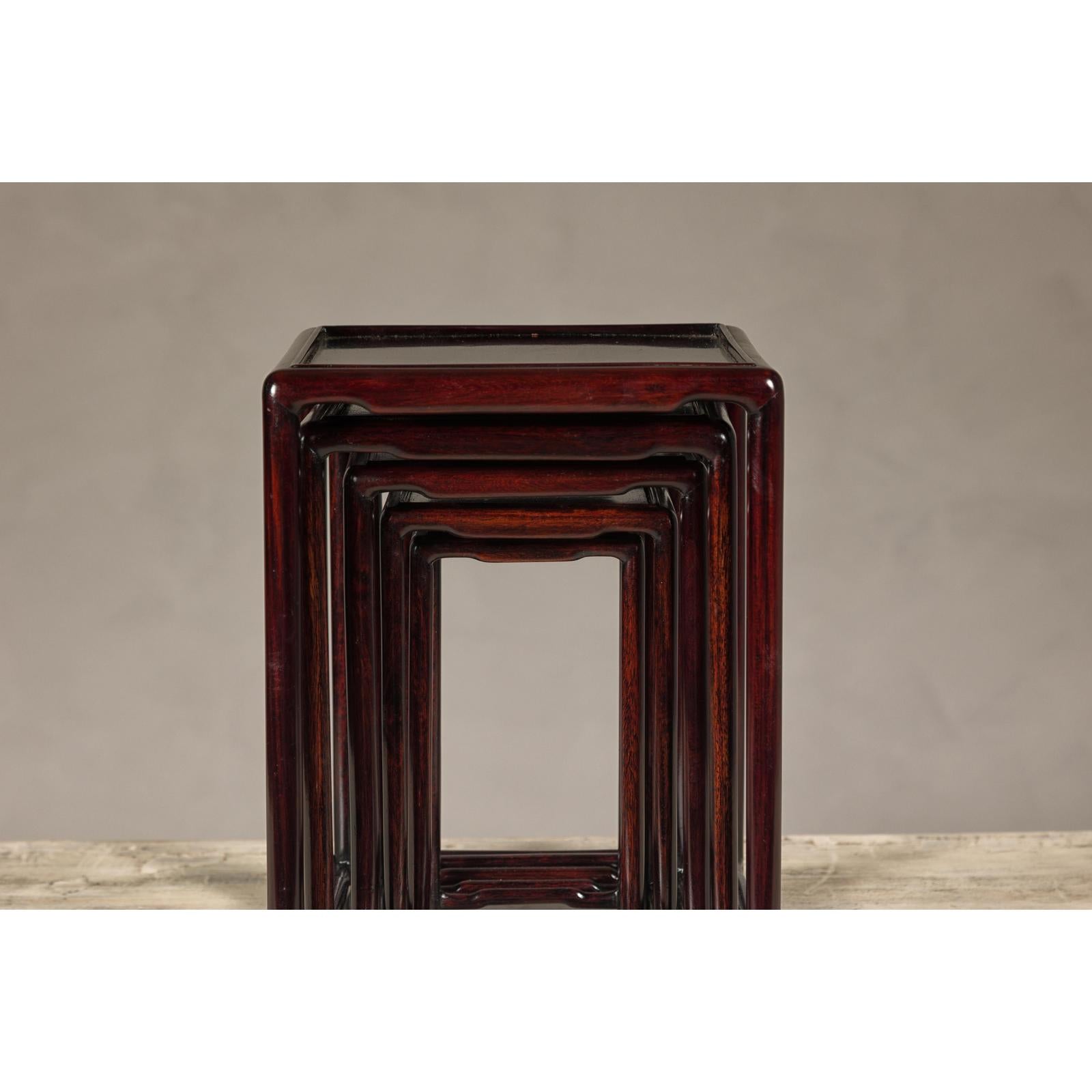 Set of Five Small Size Dark Rosewood Nesting Tables with Humpback Stretchers
