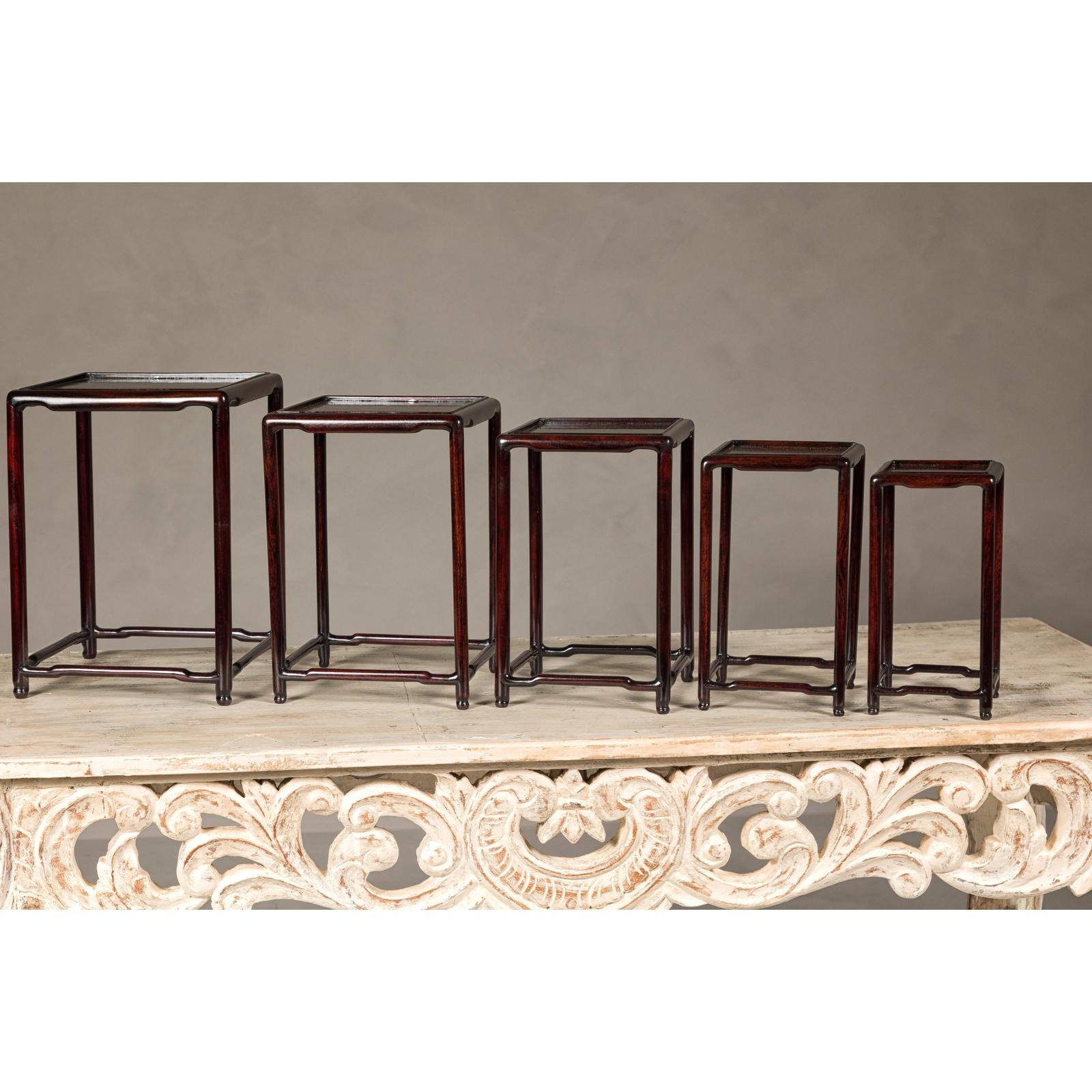 Set of Five Small Size Dark Rosewood Nesting Tables with Humpback Stretchers