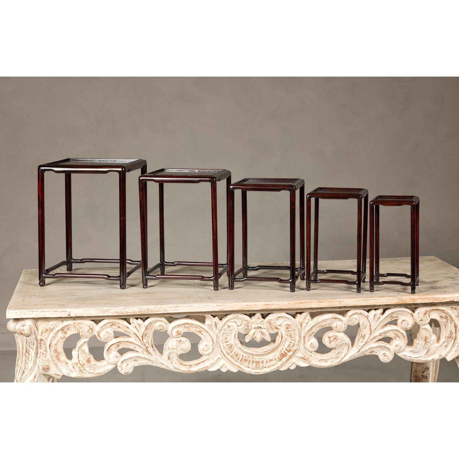 Set of Five Small Size Dark Rosewood Nesting Tables with Humpback Stretchers