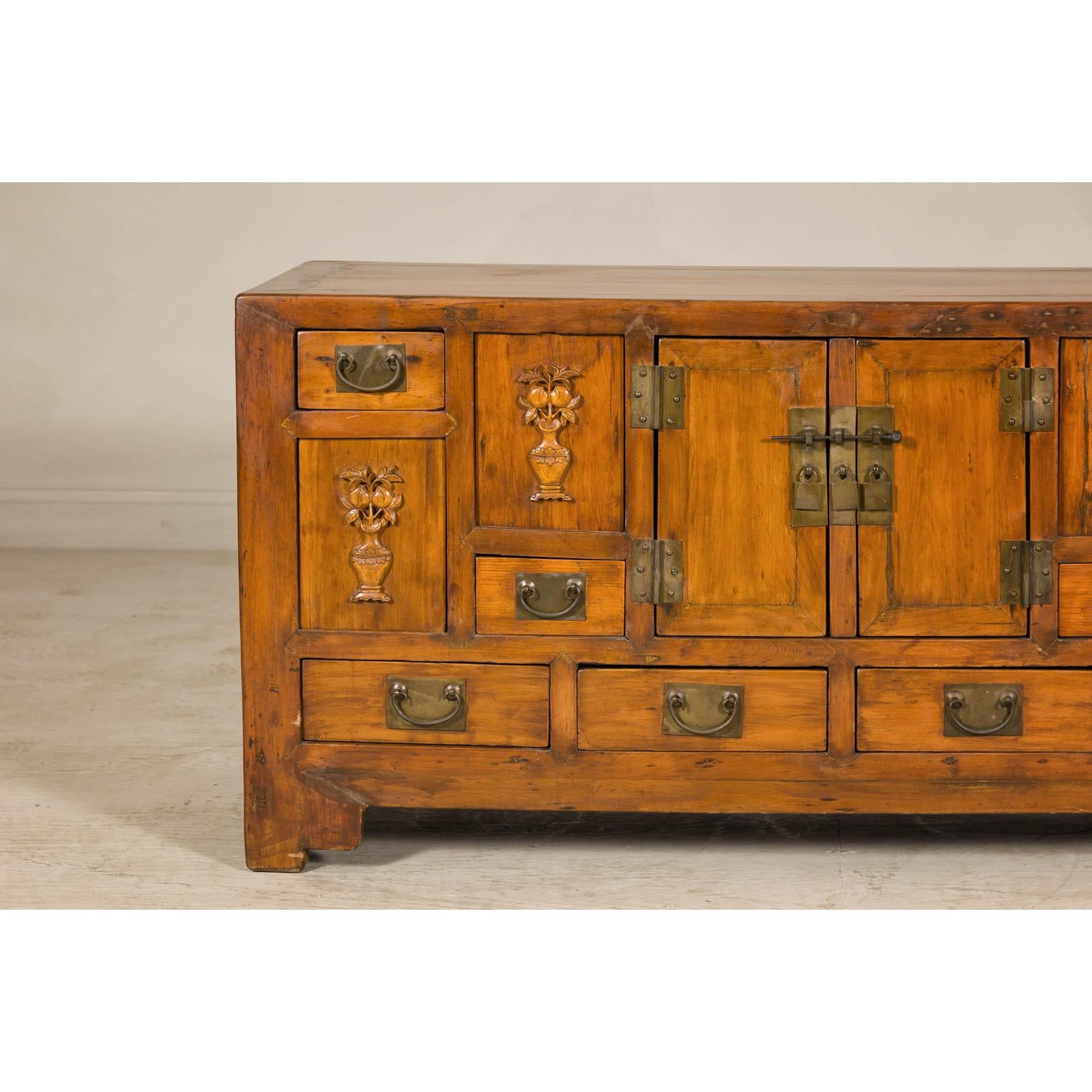 Late Qing Dynasty Elm Sideboard with Carved Floral Vases, Doors and Drawers