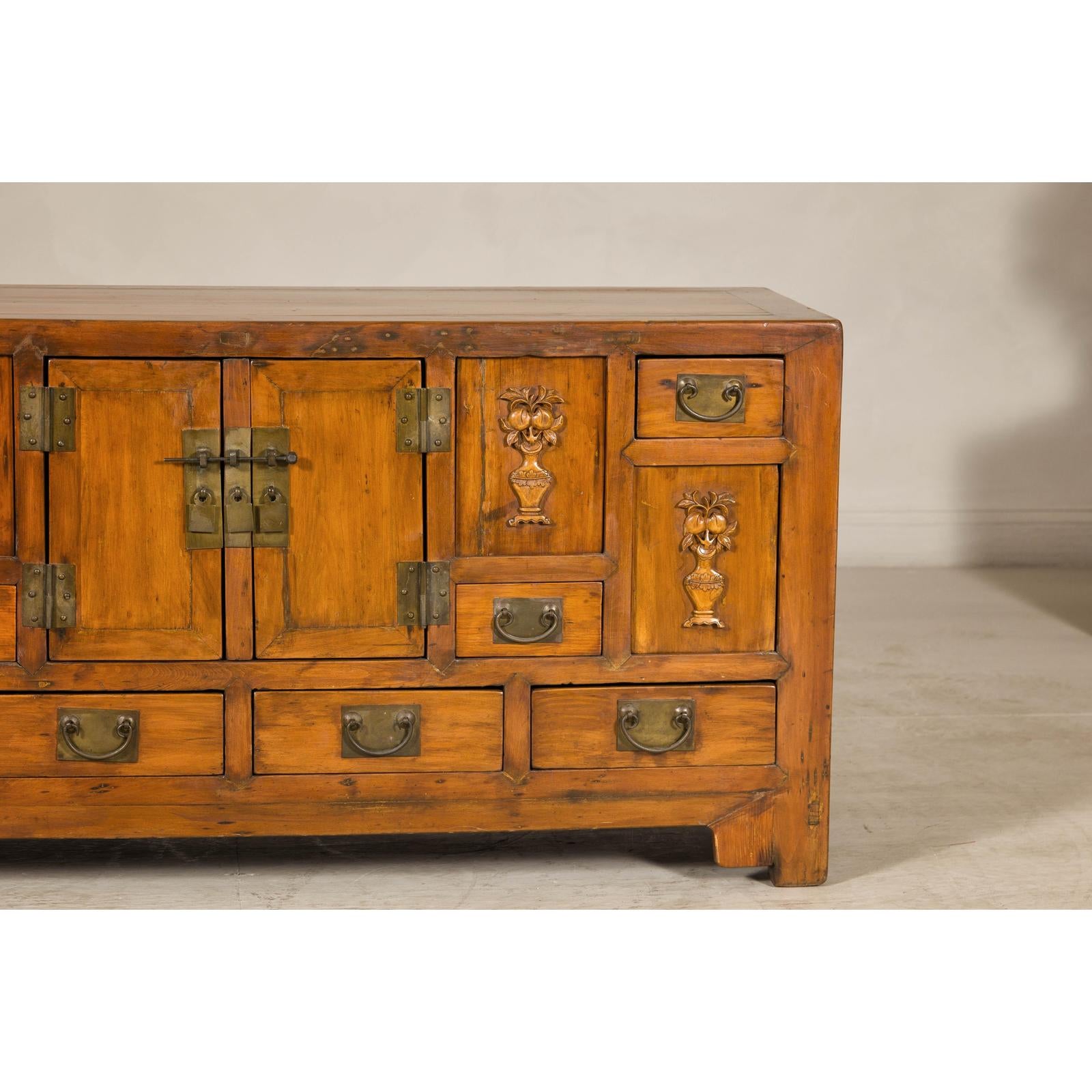 Late Qing Dynasty Elm Sideboard with Carved Floral Vases, Doors and Drawers